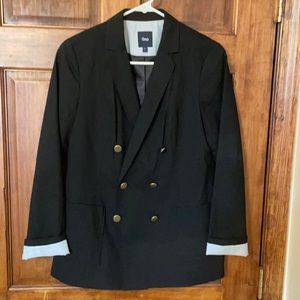 Size 4- black blazer. Sleeves can be rolled down, as well.